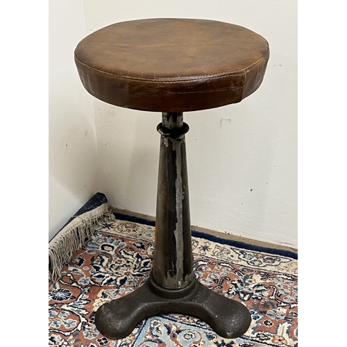 491 - Singer industrial machinist's stool, circular leather seat on cast iron base, moulded 'Singer' to th... 