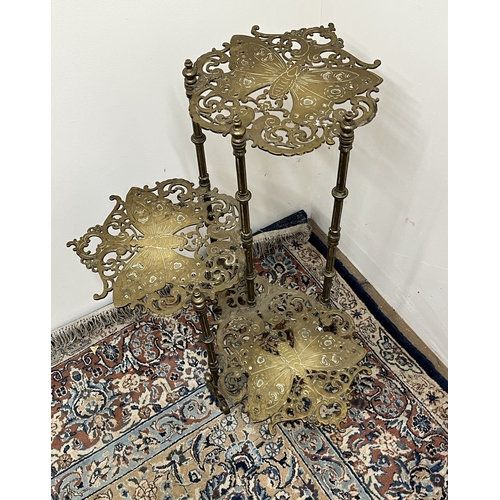 498 - Brass three tier stand, each tier with cast decoration of butterflies, H76cm