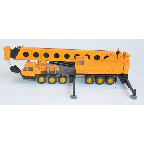 415 - Two boxed NZG 1/50 scale diecast plant models to include a Grove TM1400 Hydraulic Crane Truck in goo... 