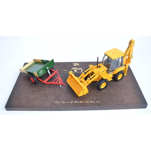 420 - Joal 1/35 diecast JCB 50 Years Commemorative set with 4CX Backhoe Loader and Farm Trailer with mould... 