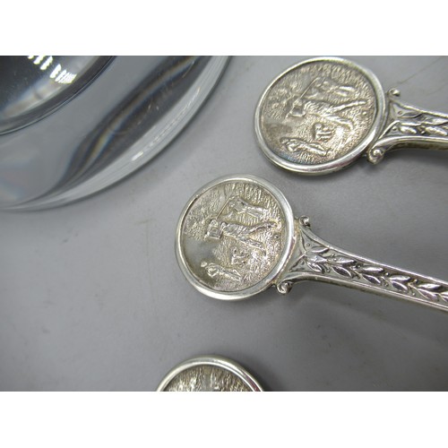 563 - Seven hallmarked Sterling silver teaspoons with golfing finials, engraved 'Basil little Trophy 1990'... 