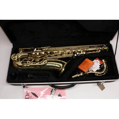 242 - Cased saxophone