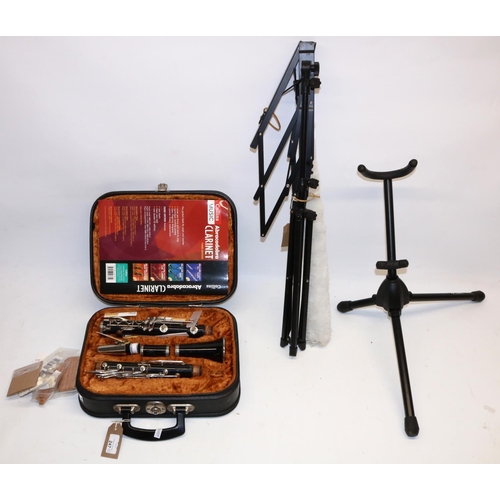 247 - Besson '35 clarinet in fitted case, a music stand and a musical instrument stand (3)