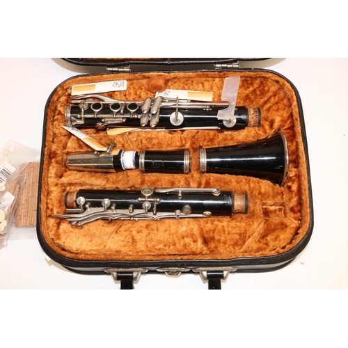 247 - Besson '35 clarinet in fitted case, a music stand and a musical instrument stand (3)