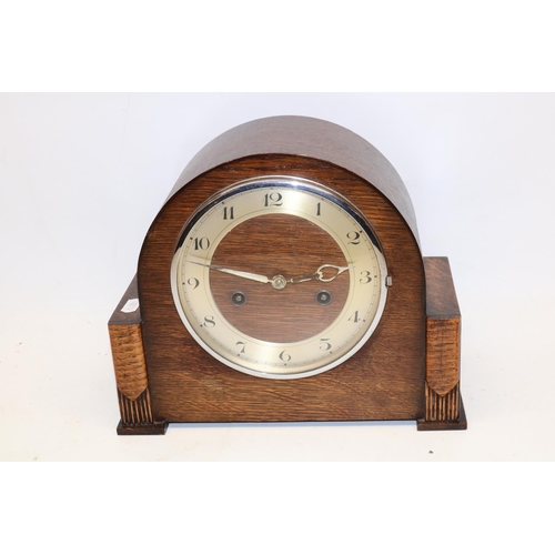 315 - 1930's H.A.C. oak striking mantel clock, chrome plated bezel enclosing silvered Arabic chapter ring,... 