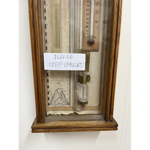 310 - Late C19th oak Admiral Fitzroy's Barometer, carved gothic case enclosing paper register no. 367815, ... 