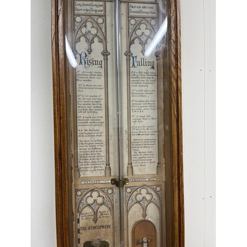 310 - Late C19th oak Admiral Fitzroy's Barometer, carved gothic case enclosing paper register no. 367815, ... 