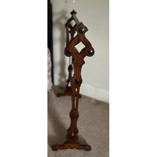 623 - Victorian mahogany towel rail on Gothic end supports, and another Victorian towel rail on curved sup... 