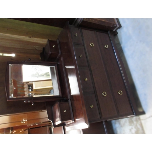 644 - Stag Minstrel bedroom suite comprising; wardrobe W128cm, dressing table, low chest of drawers with m... 