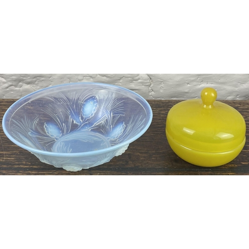 340 - Opalescent art glass bowl decorated with fir cones, probably Jobling, and an Art Deco yellow glass p... 