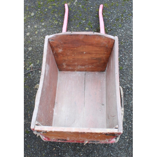 1299 - Child's wooden dog cart with metal spoked wheels 46cm x 32cm, overall length 94cm and a school slate