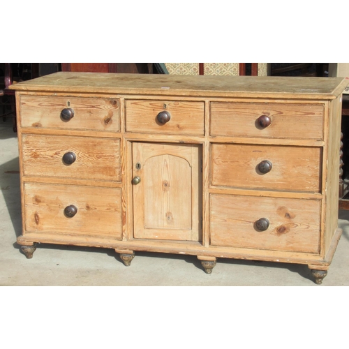 440 - Victorian pitch pine dresser, with seven drawers and a cupboard, turned wooden handles and feet, W15... 