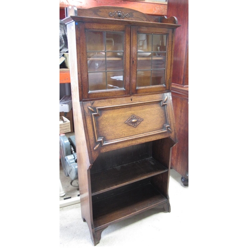 567 - C20th Ray & Miles oak bureau bookcase, two lead glazed doors above fall front and two shelves, W77cm... 