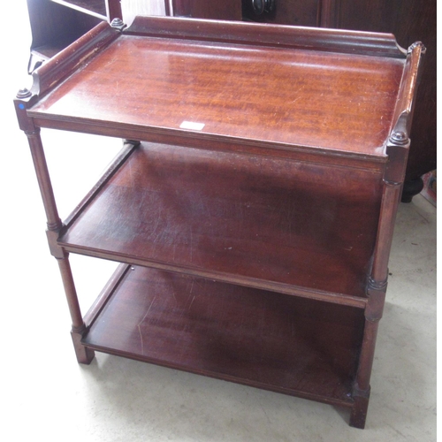 570 - C20th mahogany three tier buffet, galleried top on turned supports, W70cm D42cm H74cm