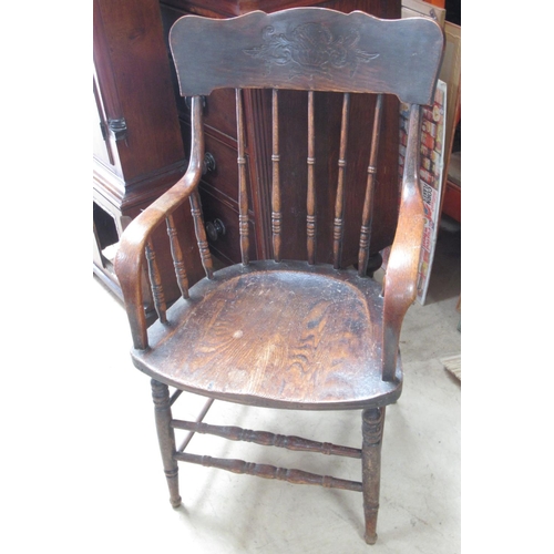 571 - Early C20th American elbow chair, with shaped cresting rail and bentwood arms on turned supports wit... 