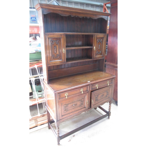 572 - C20th oak dresser, twin shelf back with two cupboards above two further cupboards and two drawers, W... 