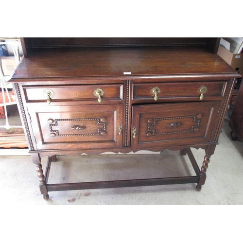 572 - C20th oak dresser, twin shelf back with two cupboards above two further cupboards and two drawers, W... 