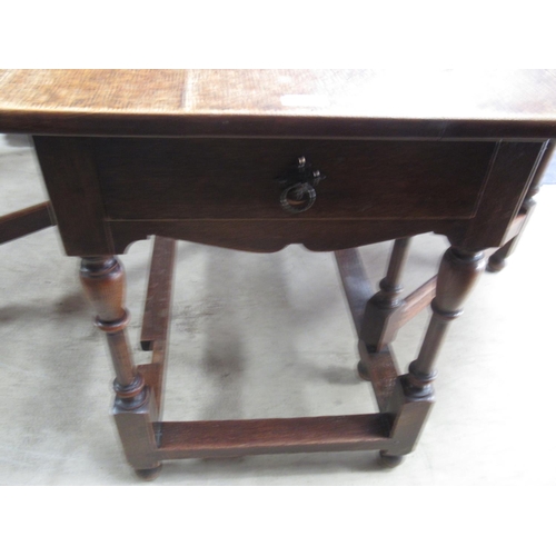 573 - C17th style oak oval gateleg dining table, with two end drawers on turned supports with stretchers, ... 