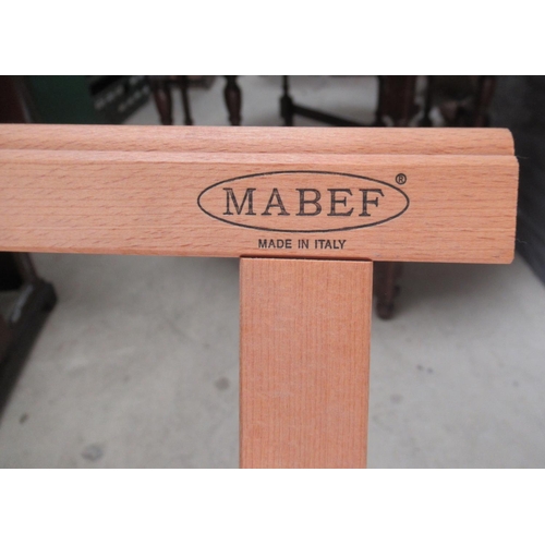 578 - Mabef beech folding folio stand, another similar and a painted music stand, (3)