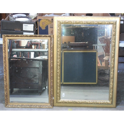 697 - Large gilt framed rectangular bevelled edge wall mirror         72cm x102cm and two other rectangula... 