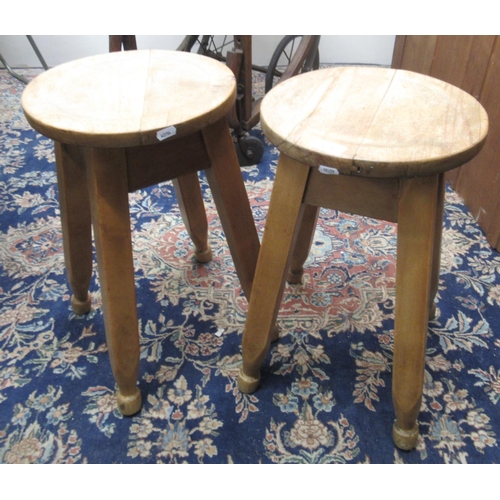 675 - Pair of beech circular top kitchen style stools, H51cm