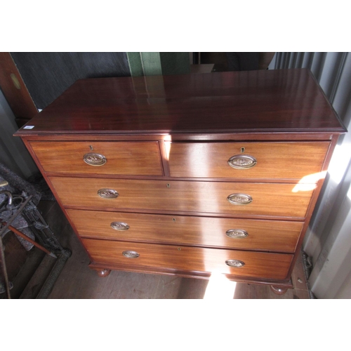 592 - Victorian mahogany chest of two short and three long drawers with oval brass handles on turned feet,... 