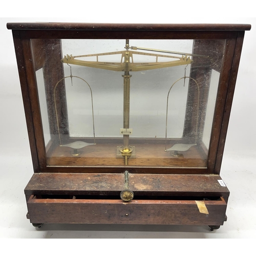 451 - L. Oertling, London - early C20th brass and mahogany cased chemical balance with drawer to base, no.... 