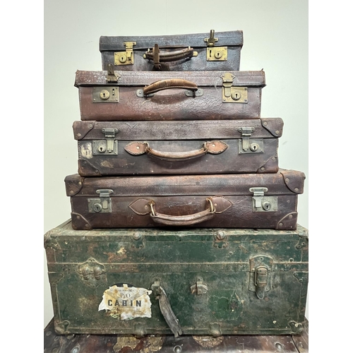 705 - Collection of vintage luggage, incl. three trunks, leather suitcases, etc. (9)