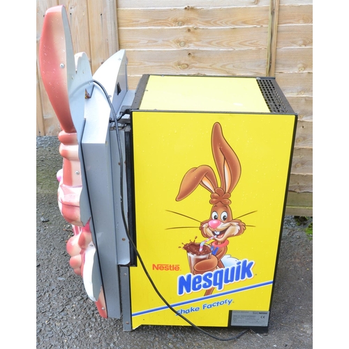 123 - Nestle Nesquik fridge, appears in working order with illuminated front, H101xW56xD61cm