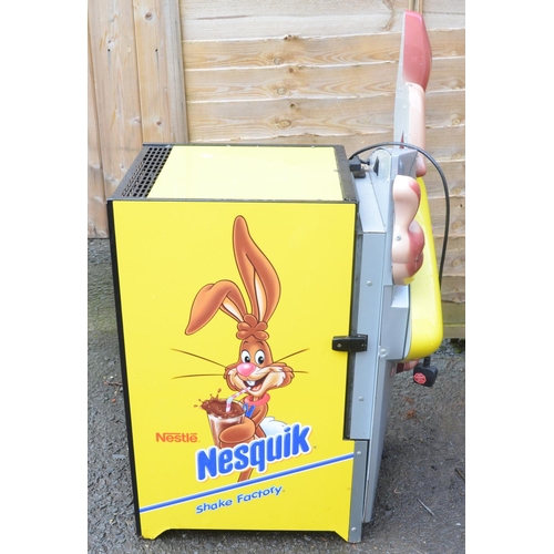 123 - Nestle Nesquik fridge, appears in working order with illuminated front, H101xW56xD61cm