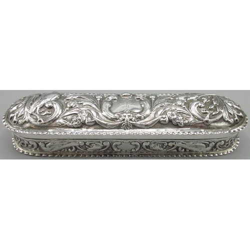 1074 - Victorian silver rounded rectangular dressing table box, all over repousse with birds scrolls and fo... 