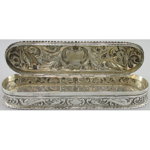 1074 - Victorian silver rounded rectangular dressing table box, all over repousse with birds scrolls and fo... 