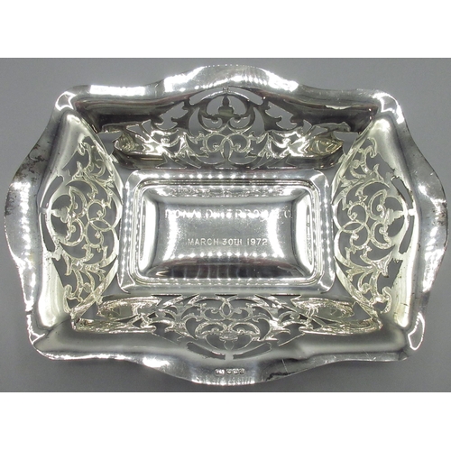 1051 - George V silver rectangular bread basket with pierced waived edge sides, engraved with presentation ... 