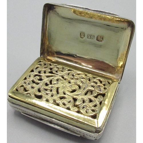 1069 - George 1V silver rectangular vinaigrette, engraved with foliage, lid with vacant cartouche, gilt int... 