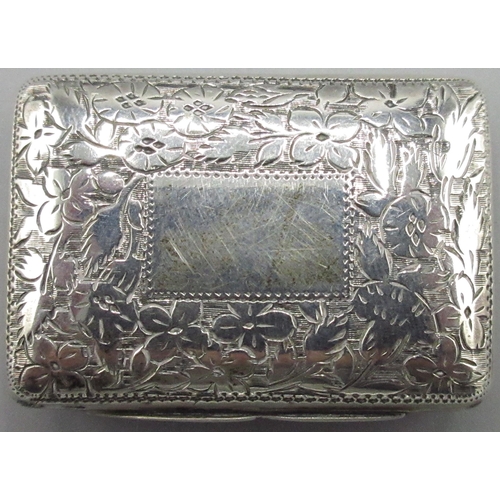 1069 - George 1V silver rectangular vinaigrette, engraved with foliage, lid with vacant cartouche, gilt int... 