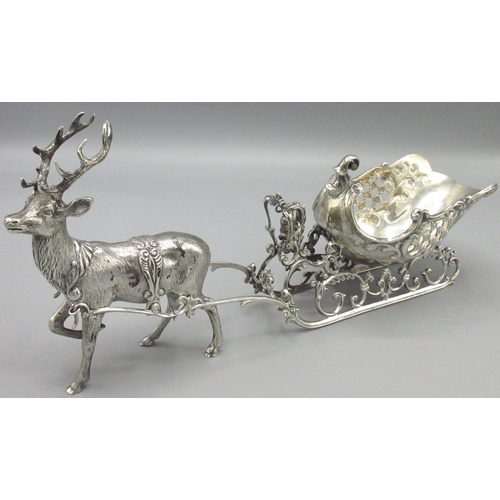 1049 - Continental silver model of a Rococo Sleigh on scroll supports, pulled by a Reindeer, stamped Sterli... 