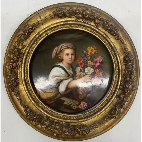 1165 - 19th century KPM porcelain circular plaque, painted with a young girl holding a flower filled vase, ... 