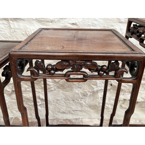 1316 - Nest of four late 19th century Chinese hardwood quartetto tables, with moulded square top and floral... 