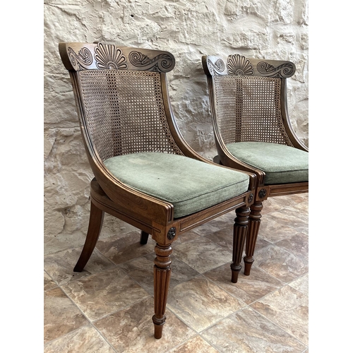 1304 - Pair of Regency rosewood library chairs, the shaped curved back with lobed and scroll carved crestin... 