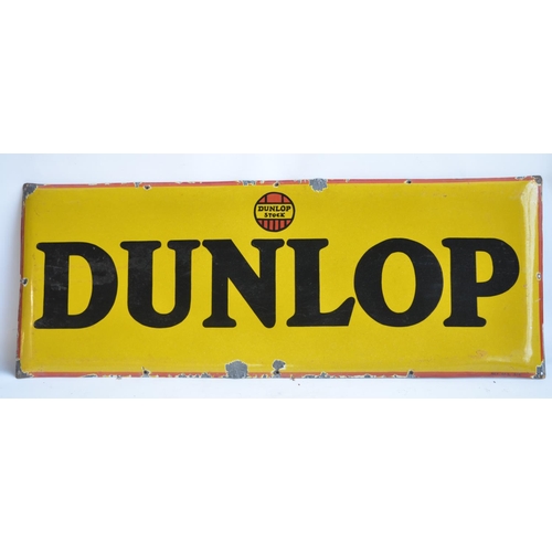 226 - Bulged enamel steel plate advertising sign for Dunlop, 106.7x40.5cm