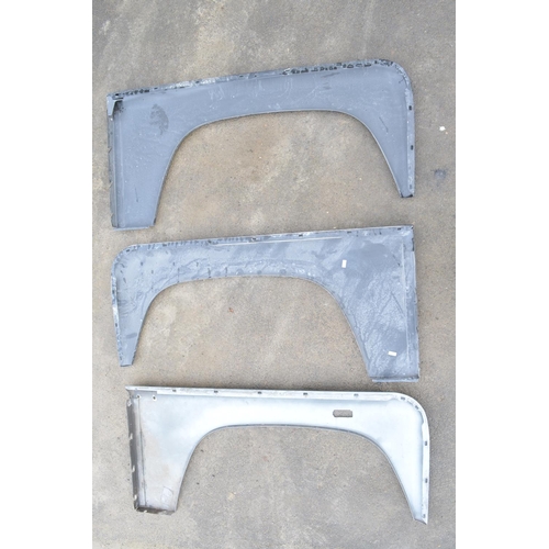 241 - Collection of aluminium Land Rover Defender front body panels to include left and right wings, 2x le... 