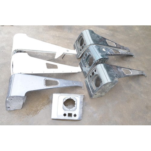 242 - Collection of aluminium Land Rover Defender front upper wing body panels, 3x left and 3x right and a... 