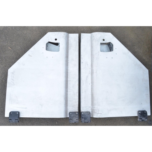 243 - Pair of aluminium Land Rover Defender front wings and pair of doors (4)