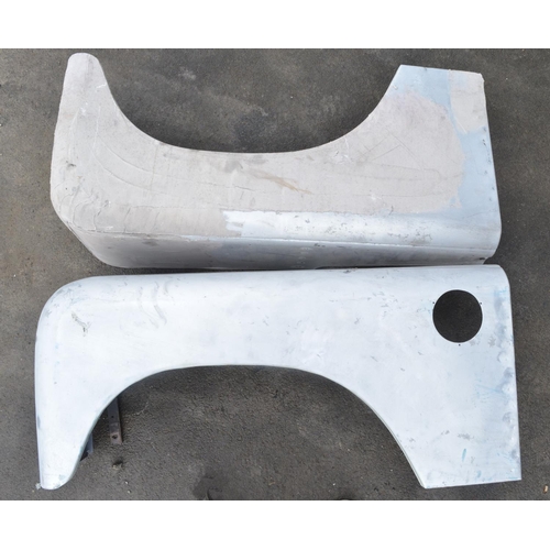 243 - Pair of aluminium Land Rover Defender front wings and pair of doors (4)