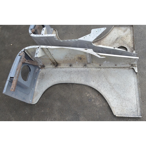 243 - Pair of aluminium Land Rover Defender front wings and pair of doors (4)