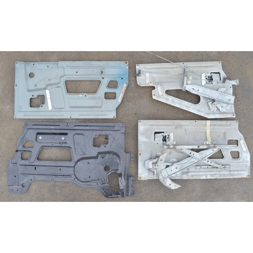 246 - Collection of Land Rover Defender body panels and assemblies to include front right and left top and... 