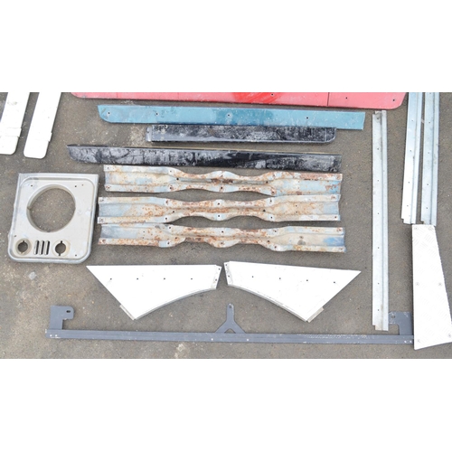 247 - Collection of metal Land Rover Defender trim and other panels and an ABS headlight panel