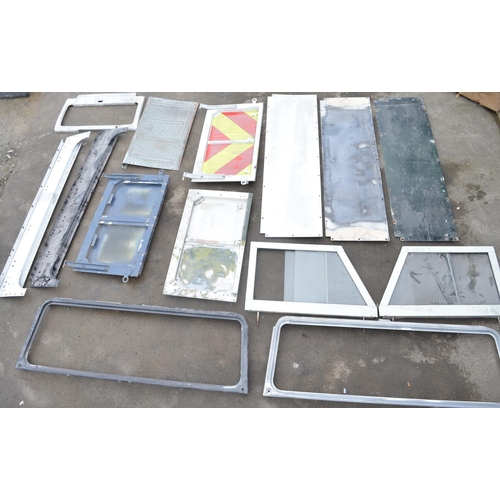 248 - Collection of Land Rover Defender and earlier series aluminium panels, windscreen surrounds, tailgat... 