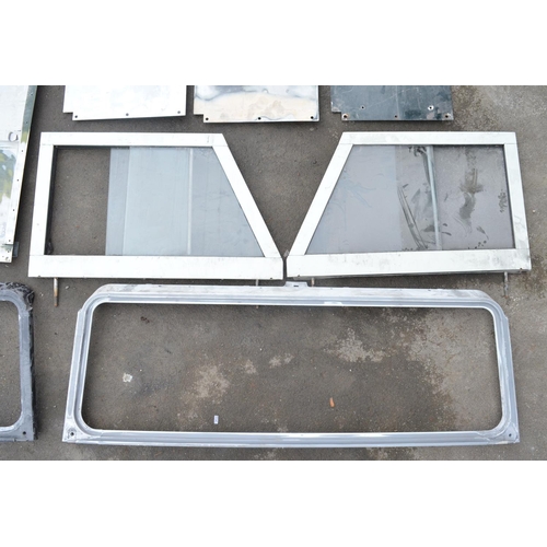 248 - Collection of Land Rover Defender and earlier series aluminium panels, windscreen surrounds, tailgat... 