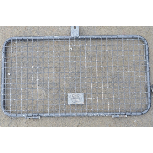 253 - Collection of steel dog guards and/or headache cage panels to include Land Rover branded examples. (... 